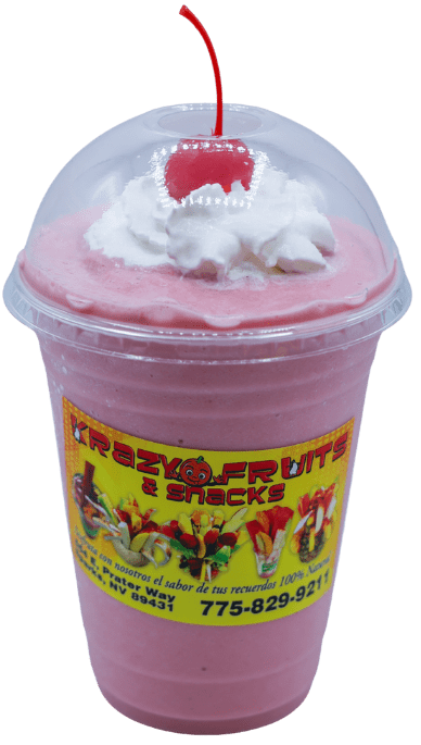 Strawberry smoothie topped with whipped cream and aa cherry at Krazy Fruits.