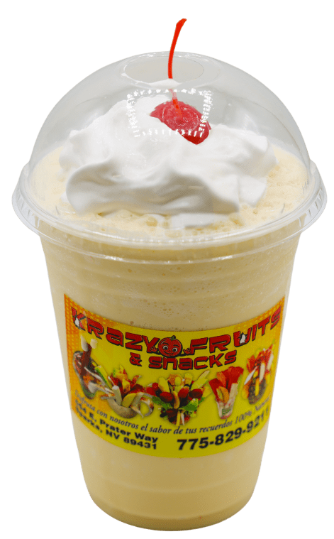 Vanilla smoothie topped with whipped cream and aa cherry at Krazy Fruits.