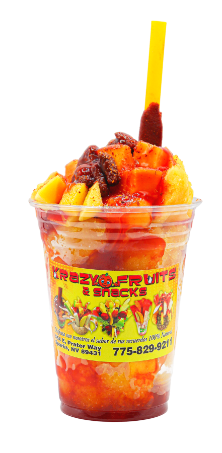 Mango ice cream mixed with diced mango, chamoy, chaca chaca candy and tamarind stick at Krazy Fruits.