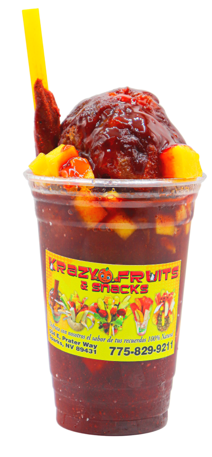Diced mango mixed with chamoy, chaca chaca candy and tamarindo straw at Krazy Fruits.