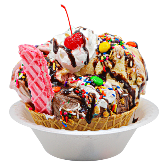 Banana split with vanilla, strawberry and chocolate ice cream. Topped with sprinkles, whipped cream, cherries and wafer at Krazy Fruits.